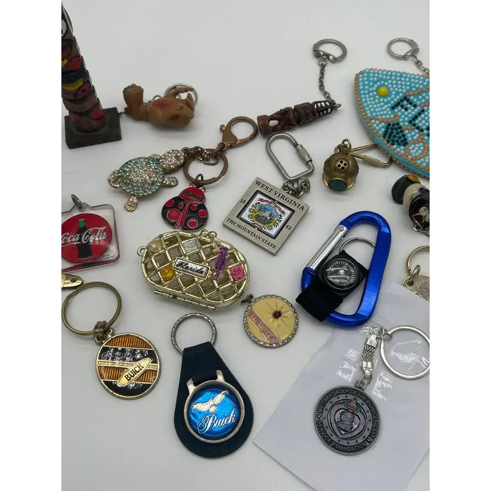 Vintage Keychain Figurine Mixed Lot of 21 ET Tiki Scuba Helmet Buick Coca Cola